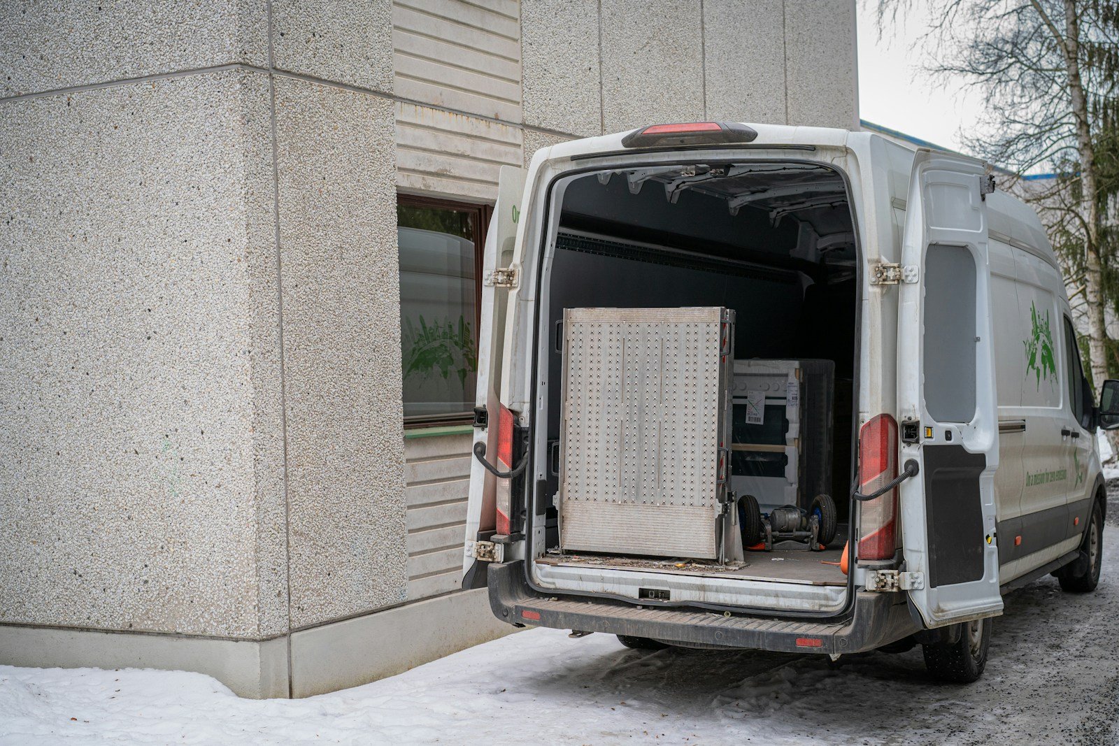 Unbranded delivery van prepared for a final-mile journey